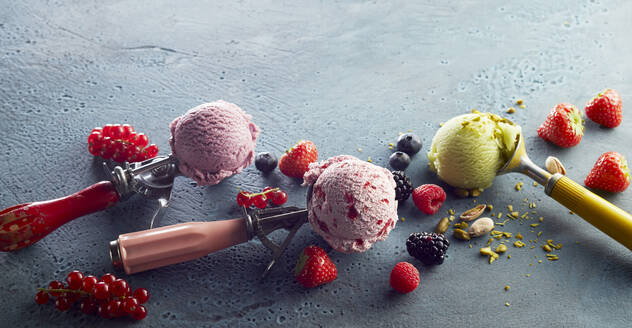 Assorted ice cream on scoop and fresh fruits - DREF00012