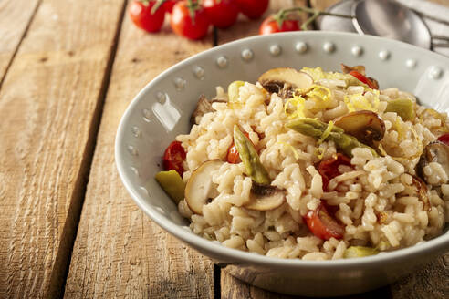 Close-up of bowl of risotto with mushrooms - DREF00025