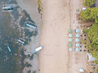 Indonesia, Bali, Sanur, Aerial view of resort beach  - KNTF04017