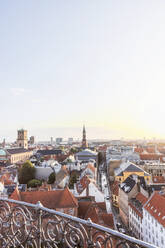 Denmark, Copenhagen, Clear sky over old town skyline at dusk - MMAF01194