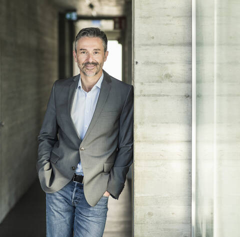 Portrait of a confident mature businessman in office stock photo