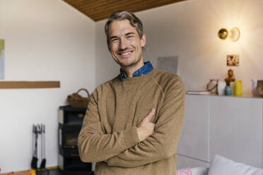 Portrait of smiling man at home - MFF05005