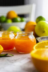 Jars of freshly squeezed orange juice - GIOF07924