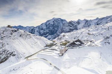 Aerial view of Rifugio Garibaldi, Ortles mount and Stelvio Pass covered with snow, Sondrio province, Valtellina, Lombardy, Italy, Europe - RHPLF13596