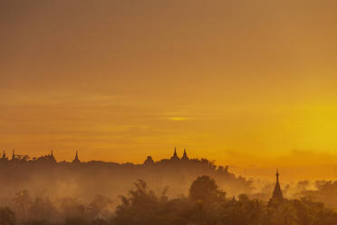 Pagoda spires at sunset, Mrauk U, Rakhine State, Myanmar (Burma), Asia - RHPLF13710