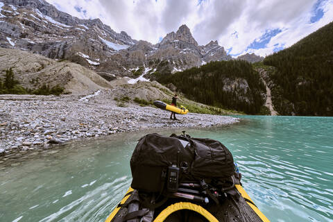 POV of an adventure raft paddle across Cirque Lake in Banff Canada. stock photo