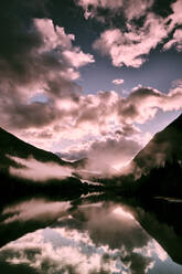 Morning fog rolls over Diablo Lake in the North Cascade National Park. - CAVF72881