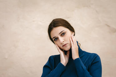 Close up portrait of woman with blue turtleneck pullover - TCEF00016