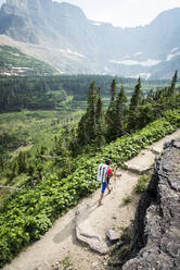 Female hiker on trail in the mountains - CAVF73143