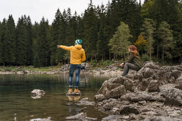 Couple at Laghi di Fusine, Friuli Venezia Giulia, Italy - MAUF03208