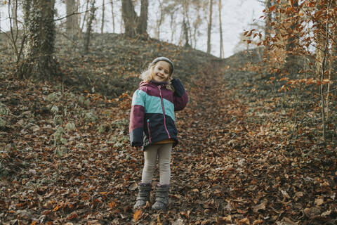 Girl during forest walk stock photo