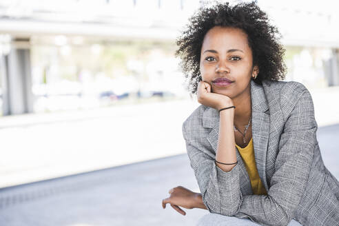 Portrait of confident young businesswoman outdoors - UUF20208