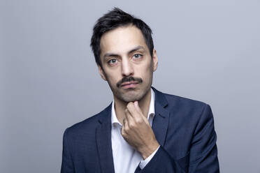 Portrait of businessman with moustache - FLLF00378