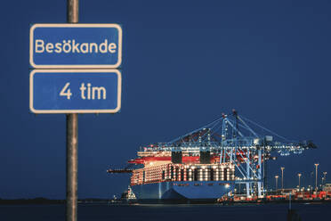 Sign, cargo ship on background - JOHF05299