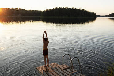 Boy on jetty - JOHF05342