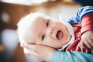 Happy baby looking at camera - JOHF05430
