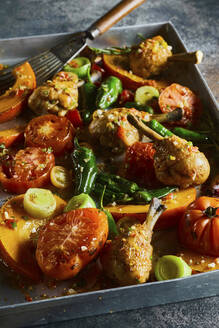 Tray with barbequed chicken legs and various vegetables - DREF00030