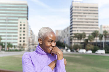 Portrait of smiling white haired woman in the city - AFVF05033