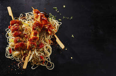 Studio shot of Asian style skewers and noodles - DREF00036