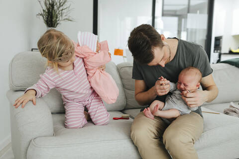 Father with two children stock photo