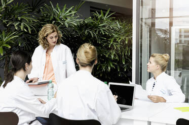 Female doctors having a meeting - BMOF00145