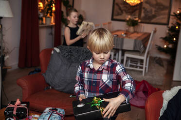 Boy with Christmas present - JOHF05823