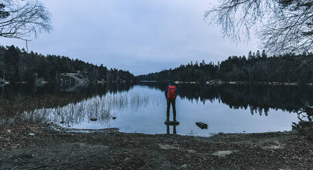 Hiker at lake - JOHF05826