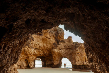 Rock arches on beach - JOHF05832