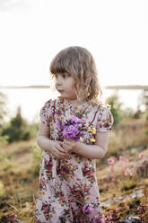 Girl picking flowers - JOHF05933