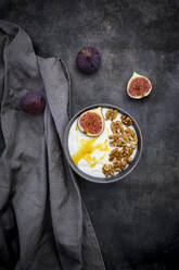 Bowl of Greek yogurt with honey, walnuts and sliced fig - LVF08559