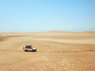 Mauritania, Banc dArguin National Park, Aerial view of off road car driving through desert - VEGF01498