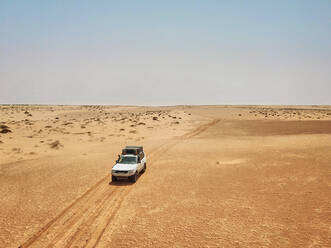 Mauritania, Banc dArguin National Park, Aerial view of off road car driving through desert - VEGF01501