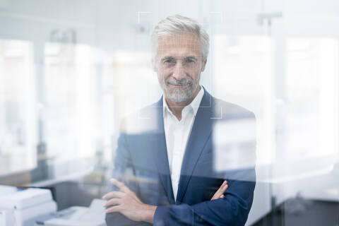 Portrait of businessman with grid over his face stock photo