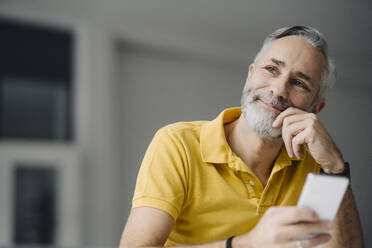 Portrait of smiling mature man with - KNSF07353