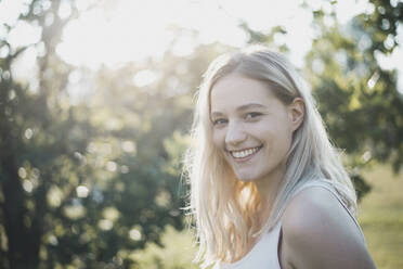 Portrait of blond young woman in nature - BFRF02180