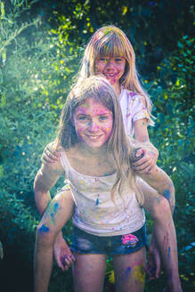 Portrait of two girls celebrating Festival of Colours - SARF04451