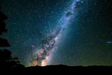 New Zealand, Milky Way galaxy on starry night sky - STSF02449