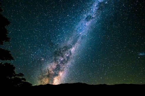 New Zealand, Milky Way galaxy on starry night sky - STSF02449