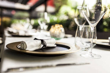 Close-up of laid table in a fancy restaurant - VABF02584