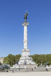 France, Gironde, Bordeaux, Low angle view of Monument aux Girondins column standing against clear blue sky - GWF06379