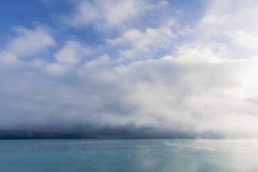 New Zealand, Oceania, South Island, Canterbury, Ben Ohau, Clouds over Lake Pukaki and Southern Alps (New Zealand Alps) - FOF11671