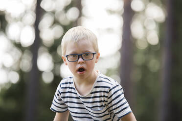 Boy posing in forest - JOHF06887