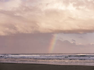 Rainbow on the Oregon coast at sunrise - CAVF74072