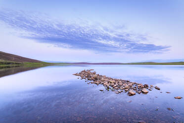 UK, Scotland, Mainland, Rocky shore of Loch of Swannay at purple dusk - SMAF01757