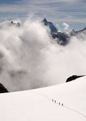 Row of hikers, Arolla, Valais Alps, Switzerland - ALRF01705