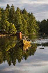 People rowing on lake - JOHF07450