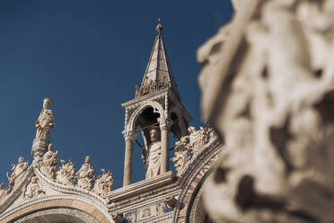 Italy, Venice, Low angle view of St. Marks cathedral - MAUF03314