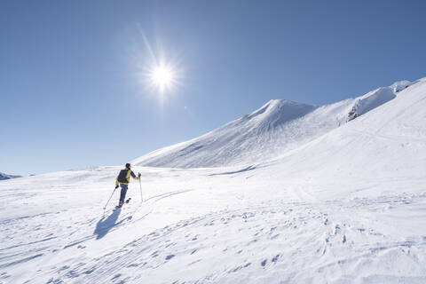 Skitourengehen, Graubünden, Schweiz, lizenzfreies Stockfoto