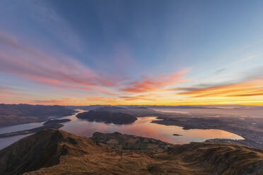 Wanaka and Lake Wanaka during sunrise, view from Roys Peak, South Island, New Zealand - FOF11822