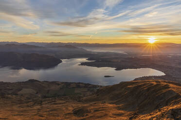 Wanaka and Lake Wanaka during sunrise, view from Roys Peak, South Island, New Zealand - FOF11825